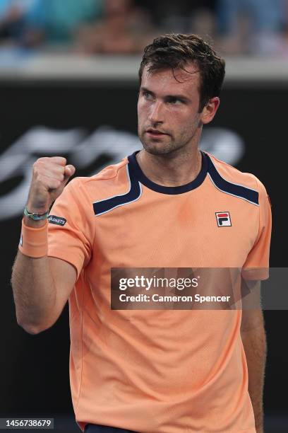 Quentin Halys of France reacts in their round one singles match against Stefanos Tsitsipas of Greece during day one of the 2023 Australian Open at...