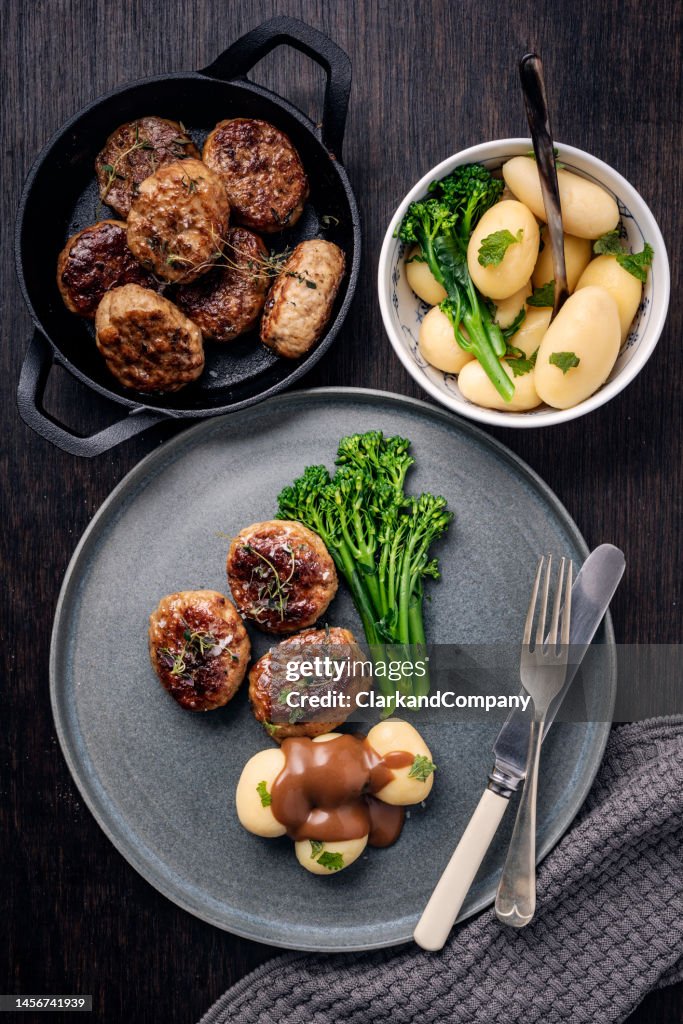 Traditional Danish Meatballs with Potatoes and Broccoli.