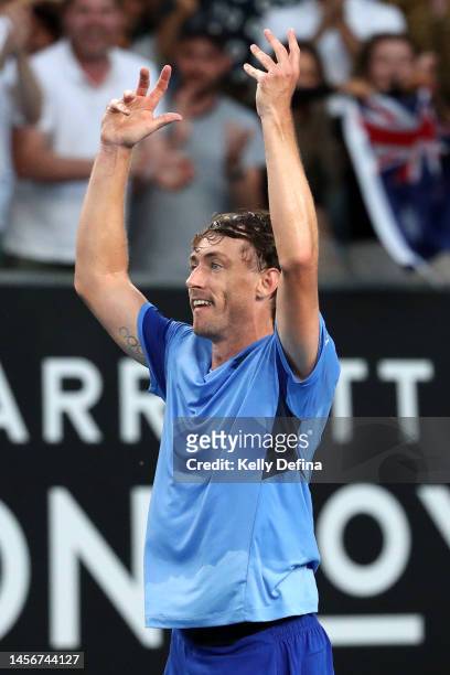 John Millman of Australia celebrates match point in their round one singles match against Marc-Andrea Huesler of Switzerland during day one of the...