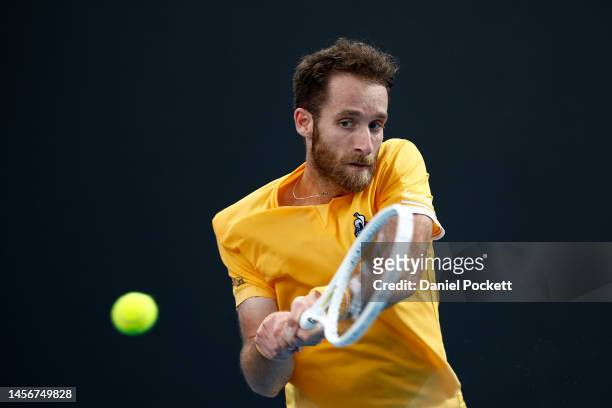 Constant Lestienne of France plays a backhand in their round one singles match against Thiago Monteiro of Brazil during day one of the 2023...