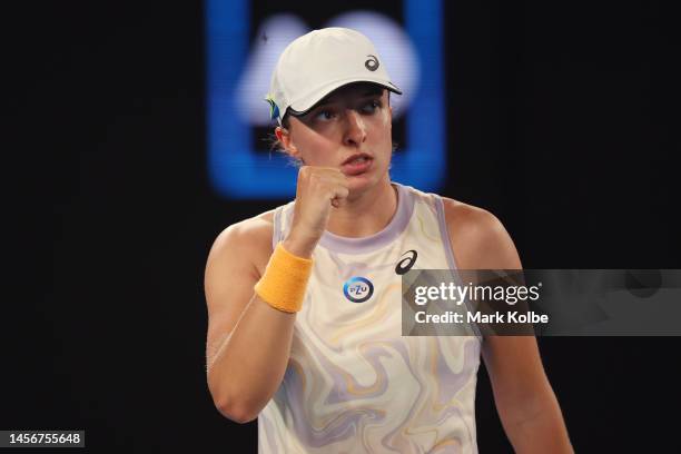 Iga Swiatek of Poland reacts in their round one singles match against Julie Niemeier of Germany during day one of the 2023 Australian Open at...