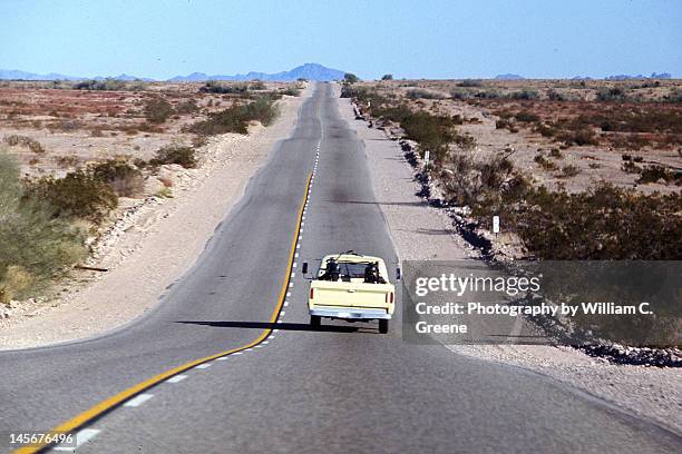 lonely road in mojave desert - 1967 stock pictures, royalty-free photos & images