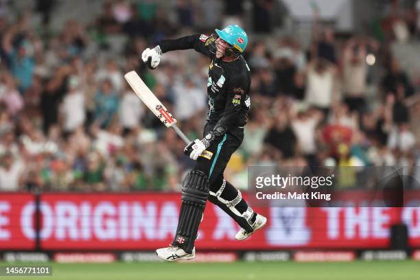 Matthew Renshaw of the Heat celebrates hitting the winning runs on the last ball of the match during the Men's Big Bash League match between the...