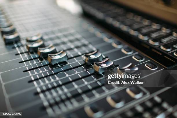 sound mixing desk with sliders and controls, full frame - scoring performance stock pictures, royalty-free photos & images