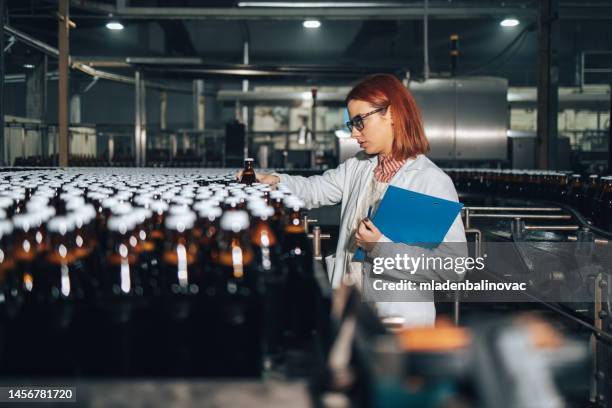 beer bottling factory - bottling plant stock pictures, royalty-free photos & images