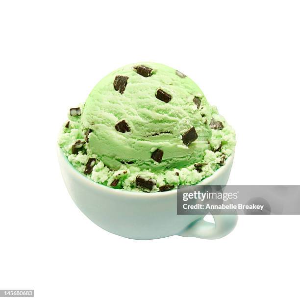 scoop of mint chocolate chip ice cream on white - mint ice cream stock pictures, royalty-free photos & images