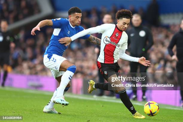 Ben Godfrey of Everton in action with Samuel Edozie of Southampton during the Premier League match between Everton FC and Southampton FC at Goodison...