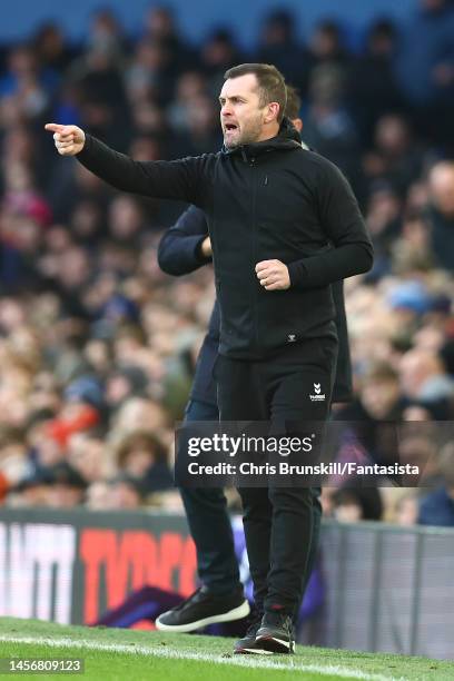 Southampton manager Nathan Jones gestures from the touchline during the Premier League match between Everton FC and Southampton FC at Goodison Park...