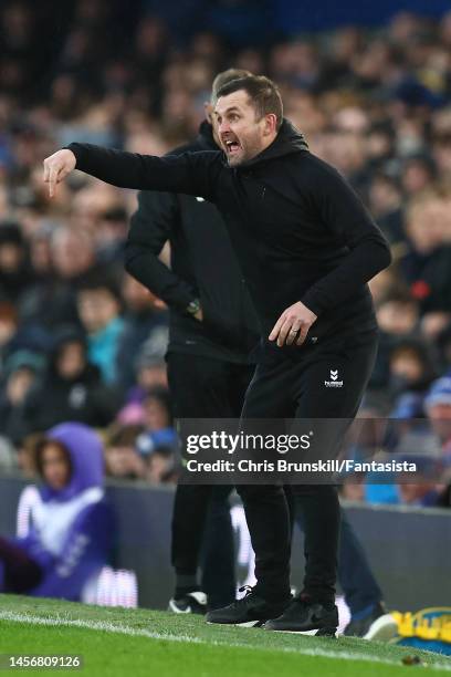 Southampton manager Nathan Jones gestures from the touchline during the Premier League match between Everton FC and Southampton FC at Goodison Park...