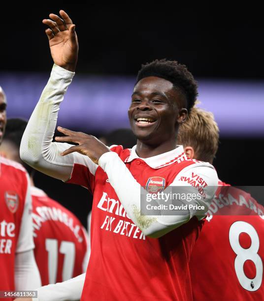 Bukayo Saka celebrates the 2nd Arsenal goal during the Premier League match between Tottenham Hotspur and Arsenal FC at Tottenham Hotspur Stadium on...