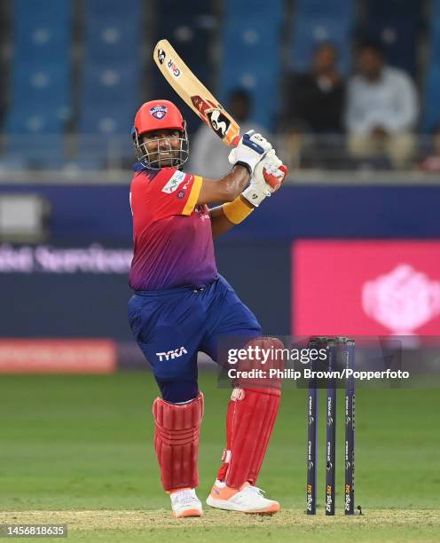 Robin Uthappa of Dubai Capitals hits out during the Dubai Capitals against Gulf Giants match in the DP World ILT20 at Dubai International Stadium on...