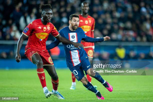 January 11: Lionel Messi of Paris Saint-Germain defended by Batista Mendy of Angers during the Paris Saint-Germain V Angers, French Ligue 1 regular...