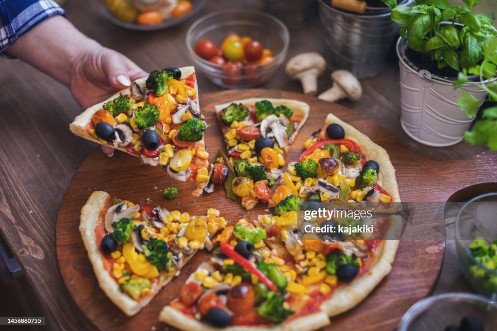 Vegetarian Pizza with Broccoli, Cherry Tomato, Pepper and Mushrooms