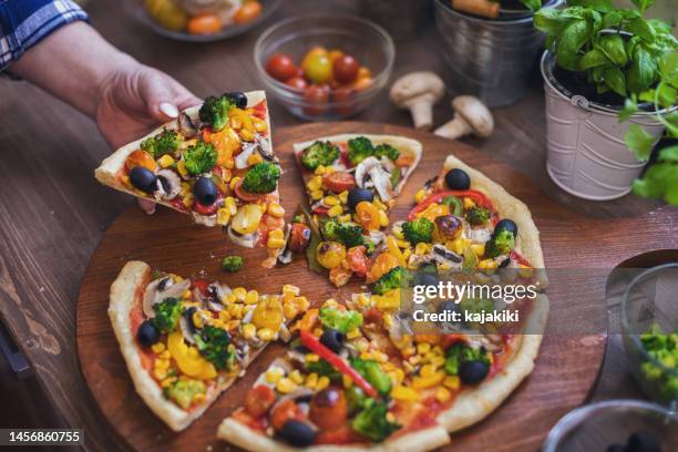 vegetarian pizza with broccoli, cherry tomato, pepper and mushrooms - vegetarian pizza stock pictures, royalty-free photos & images