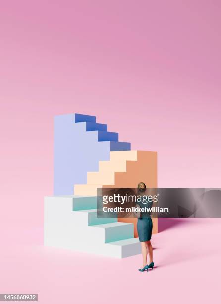 female businesswoman ready to overcome a challenge - stairway stock pictures, royalty-free photos & images
