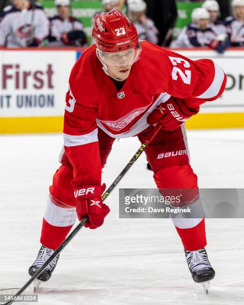 Lucas Raymond of the Detroit Red Wings gets set for the face-off against the Columbus Blue Jackets during the first period an NHL game at Little...