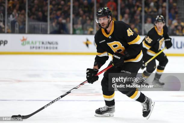 David Krejci of the Boston Bruins skates in his 1000th career NHL game during the first period of the game between Boston Bruins and the Philadelphia...