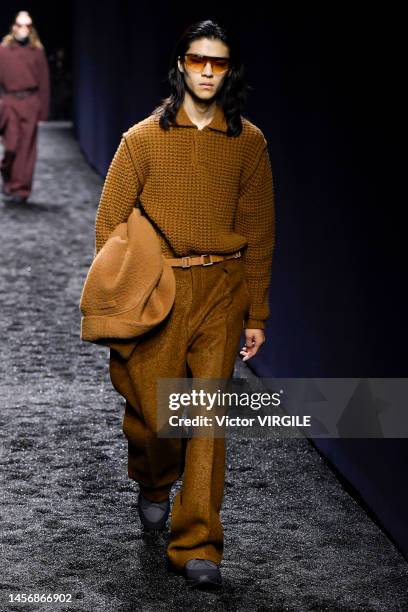 Model walks the runway during the Zegna Ready to Wear Fall/Winter 2023-2024 fashion show as part of the Milan Men Fashion Week on January 16, 2022 in...