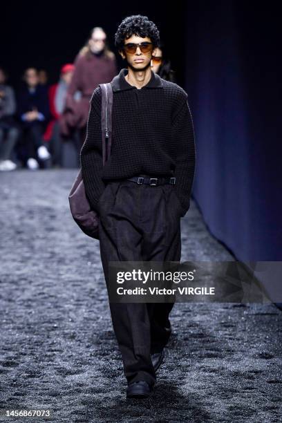 Model walks the runway during the Zegna Ready to Wear Fall/Winter 2023-2024 fashion show as part of the Milan Men Fashion Week on January 16, 2022 in...