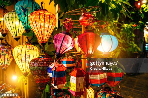 colored silk lanterns in hoi an an ancient city in vietnam - chinees lantaarnfeest stockfoto's en -beelden