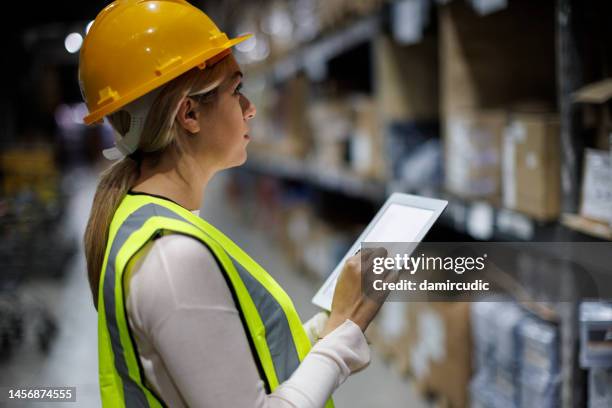 employees working in the warehouse - digitization stock pictures, royalty-free photos & images