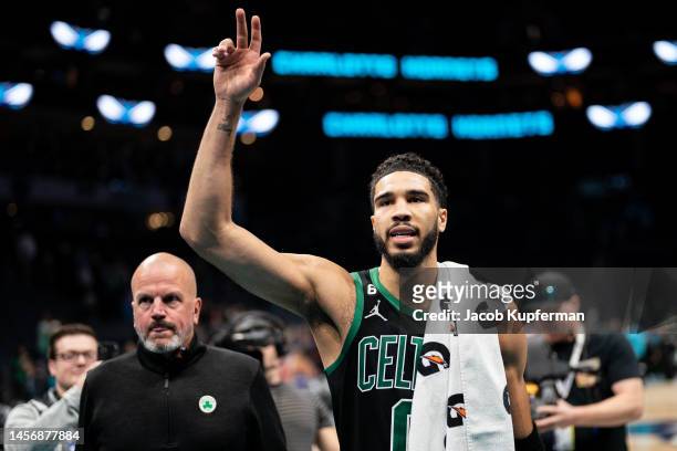 Jayson Tatum of the Boston Celtics walks off the court after defeating the Charlotte Hornets and scoring 51 points in his game at Spectrum Center on...