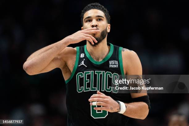 Jayson Tatum of the Boston Celtics reacts in the fourth quarter during their game against the Charlotte Hornets at Spectrum Center on January 16,...