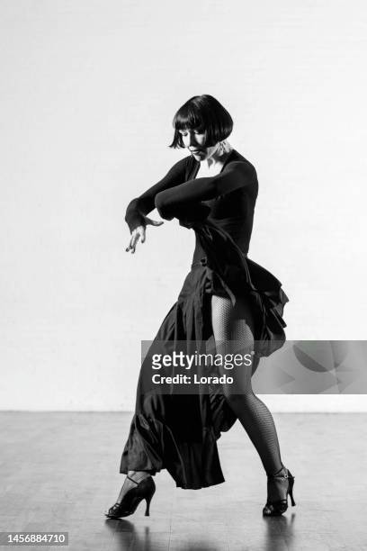 beautiful elegant athletic woman dancing alone - dancing for ned stock pictures, royalty-free photos & images