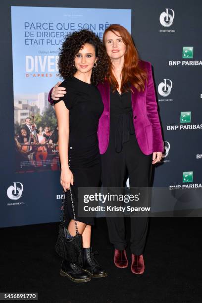 Oulaya Amamra and Marie-Castille Mention-Schaar attend the Divertimento Premiere at Le Grand Rex on January 16, 2023 in Paris, France.