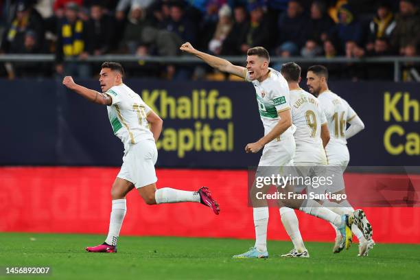 Ezequiel Ponce of Elche CF celebrates with teammates after scoring the team's first goal during the LaLiga Santander match between Cadiz CF and Elche...