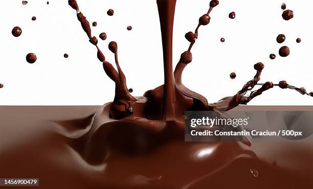 close-up of splashing coffee beans,romania - milk chocolate fotografías e imágenes de stock