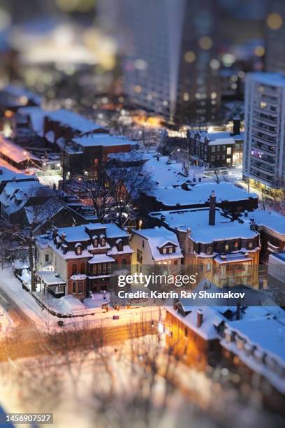 snowy blue hour in miniature town - toronto landscape stock pictures, royalty-free photos & images