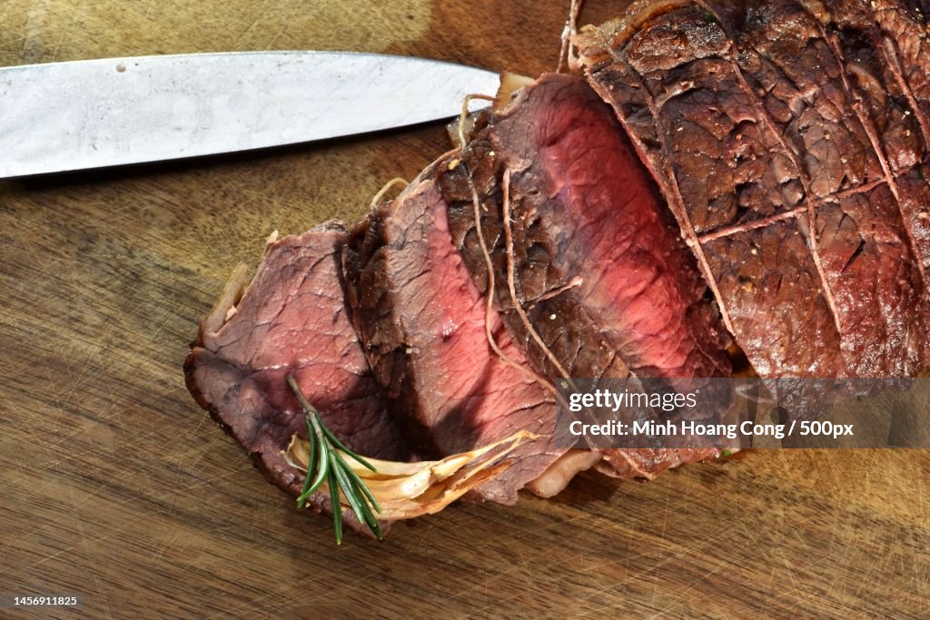 High angle view of meat on cutting board,France