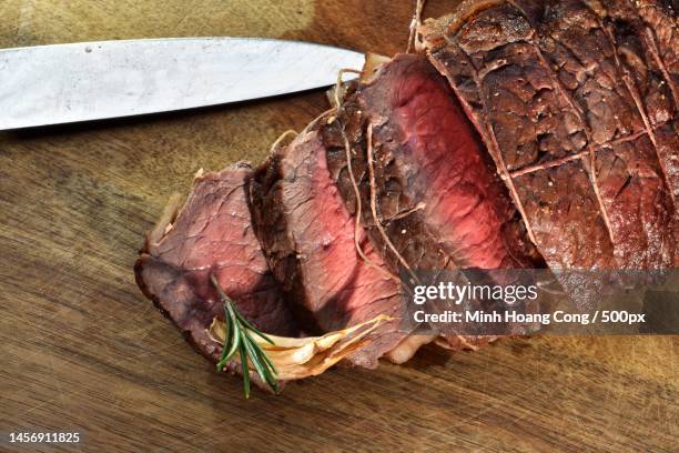 high angle view of meat on cutting board,france - red meat stock pictures, royalty-free photos & images