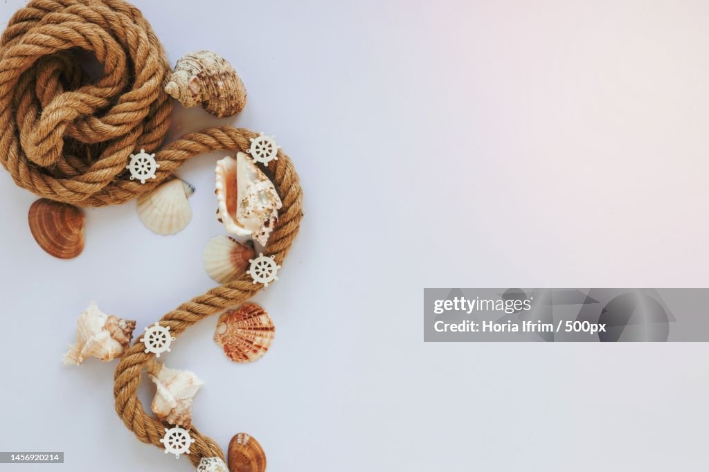 Shell Ropes Sea Shells With Nautical Rope White Table High-Res Stock Photo - Getty ...