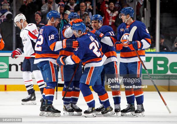 The New York Islanders celebrate a first period goal by Sebastian Aho against the Washington Capitals at the UBS Arena on January 16, 2023 in Elmont,...