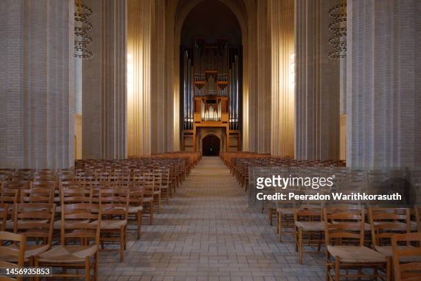 the nave atrium of grundtvig church, iconic expressionist protestant church. - christianity bildbanksfoton och bilder