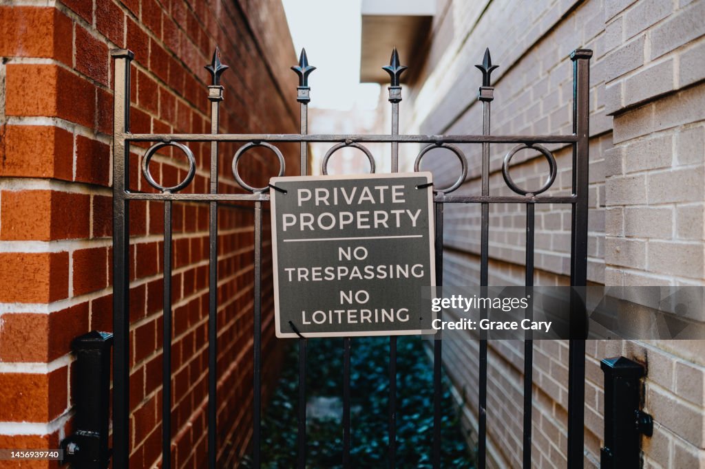 No Trespassing Sign on Gate