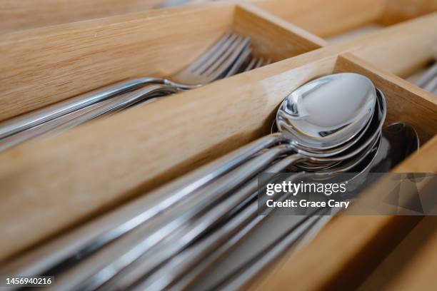 utensils in kitchen drawer - essbesteck stock-fotos und bilder