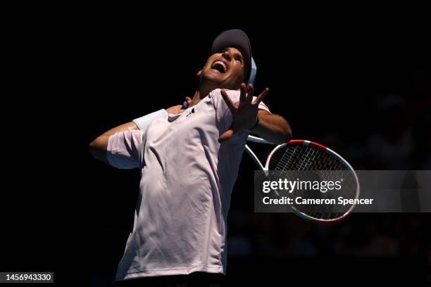 Dominic Thiem of Austria serves in their round one singles match against Andrey Rublev during day two of the 2023 Australian Open at Melbourne Park...