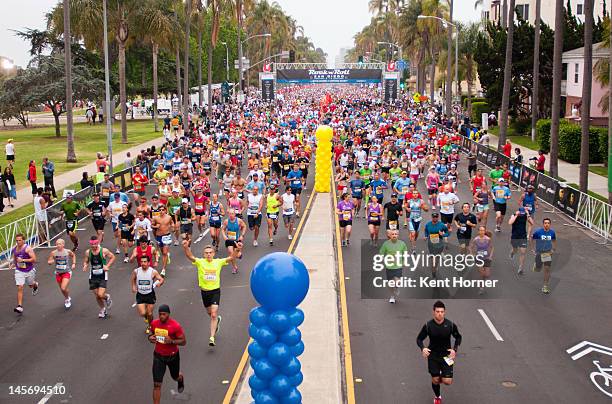 Participants run along 6th Avenue near Balboa Park in the 15th annual Rock 'n' Roll Marathon on June 3, 2012 in San Diego, California.