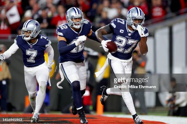 Jayron Kearse of the Dallas Cowboys celebrates after intercepting a pass against the Tampa Bay Buccaneers during the second quarter in the NFC Wild...