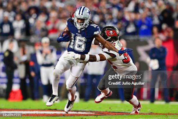 Hilton of the Dallas Cowboys carries the ball against the Tampa Bay Buccaneers during the first half in the NFC Wild Card playoff game at Raymond...