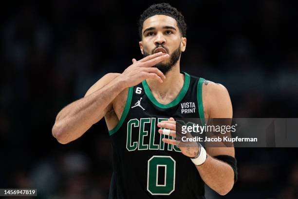 Jayson Tatum of the Boston Celtics reacts during their game against the Charlotte Hornets at Spectrum Center on January 16, 2023 in Charlotte, North...