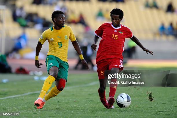 Katlego Mphela of South Africa and Minyahile Beyene during the 2014 FIFA World Cup Qualifier match between South Africa and Ethiopia at Royal...