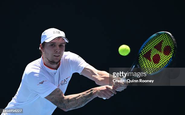 Alexander Bublik of Kazakhstan plays a backhand in their round one singles match against Alejandro Davidovich Fokina of Spain during day two of the...