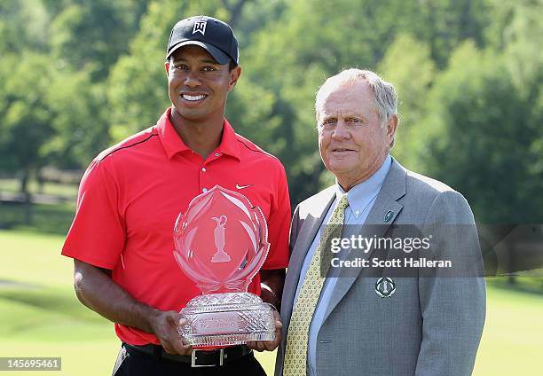 Tournament founder Jack Nicklaus poses with Tiger Woods after Tiger's two-stroke victory at the Memorial Tournament presented by Nationwide Insurance...