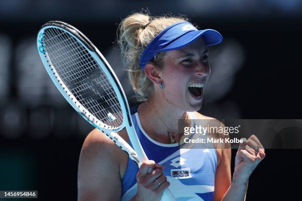 Elise Mertens of Belgium celebrates match point in their round one singles match against Garbine Muguruza of Spain during day two of the 2023...