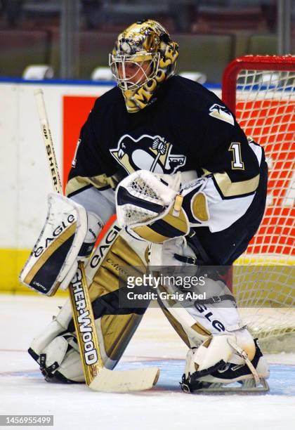 Johan Hedberg of the Pittsburgh Penguins skates against the Toronto Maple Leafs during NHL game action on October 14, 2002 at Air Canada Centre in...
