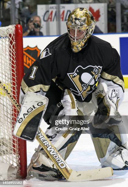 Johan Hedberg of the Pittsburgh Penguins skates against the Toronto Maple Leafs during NHL game action on October 14, 2002 at Air Canada Centre in...